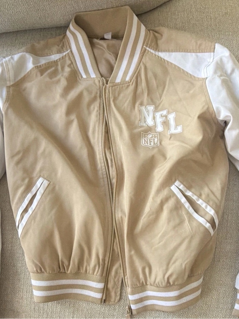 NFL Women's Tan and White Bomber Jacket